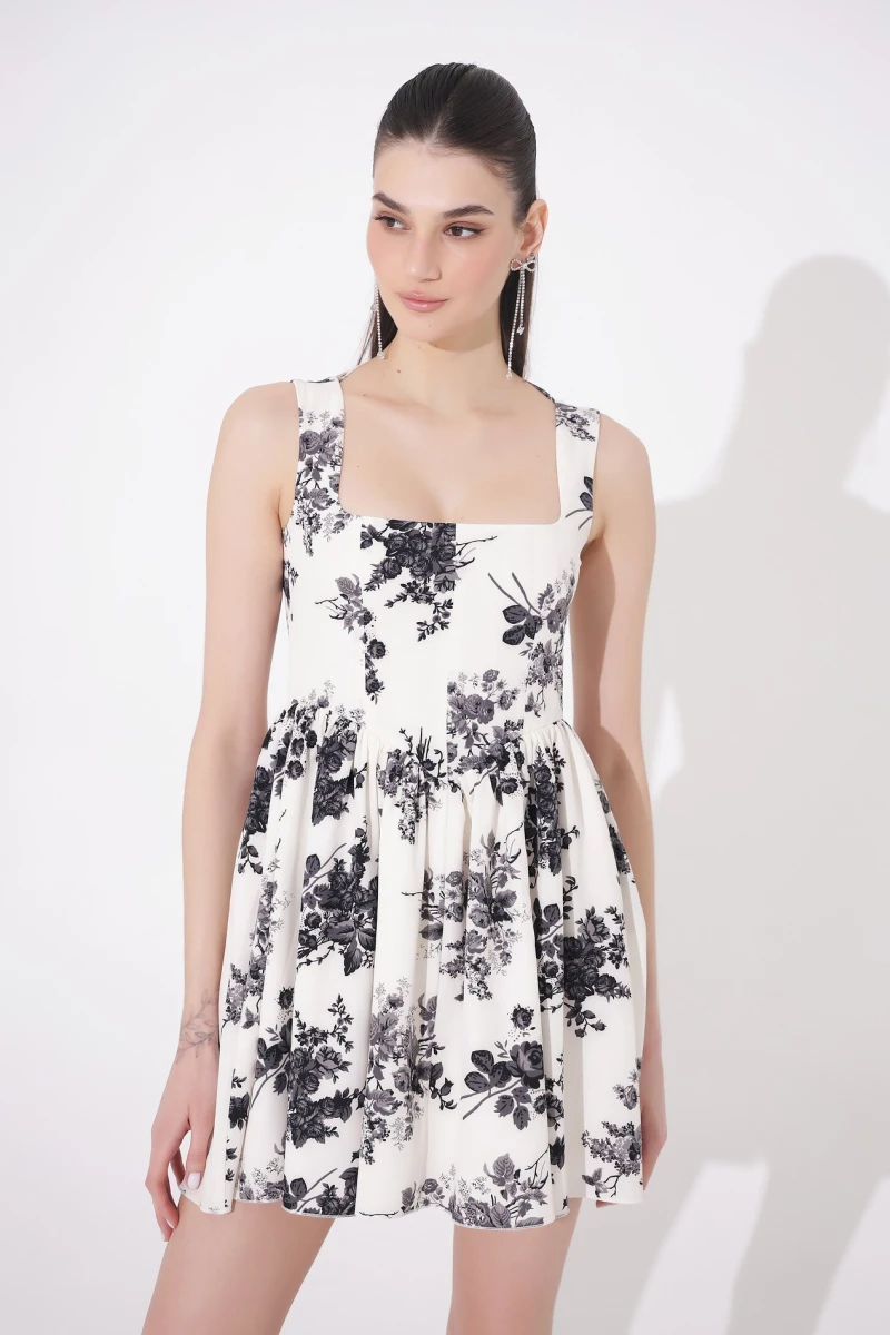 Mini sundress with black roses print on milky 