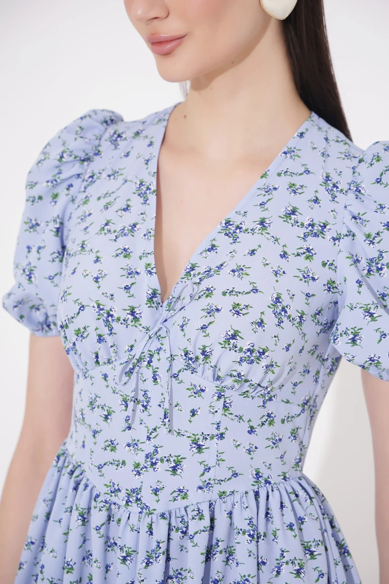 Mini dress with floral print on blue