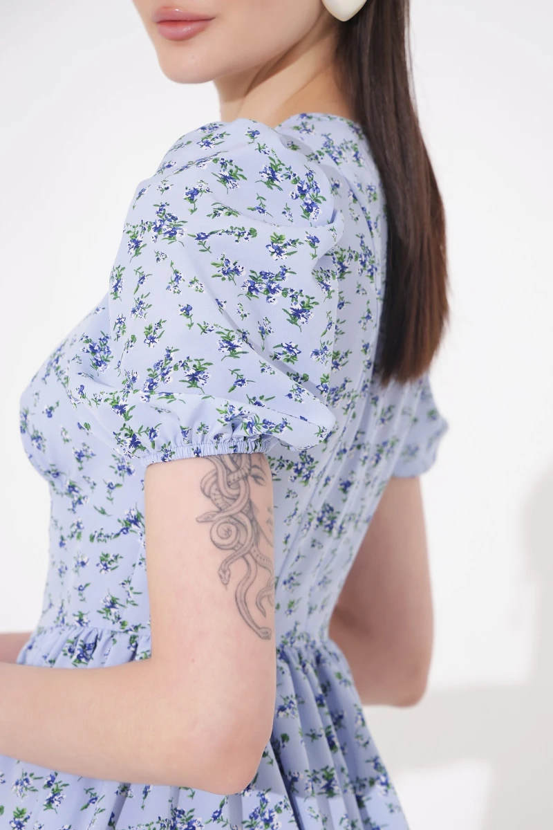 Mini dress with floral print on blue