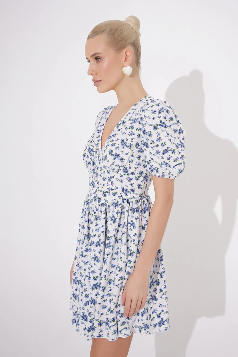 Mini dress with floral print on milky 