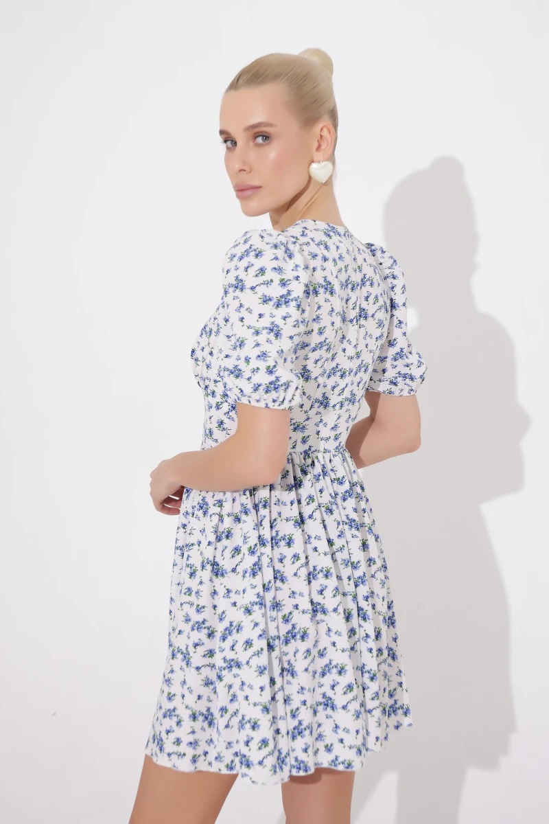 Mini dress with floral print on milky 