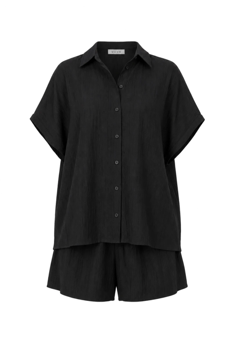 Black shirt and shorts suit