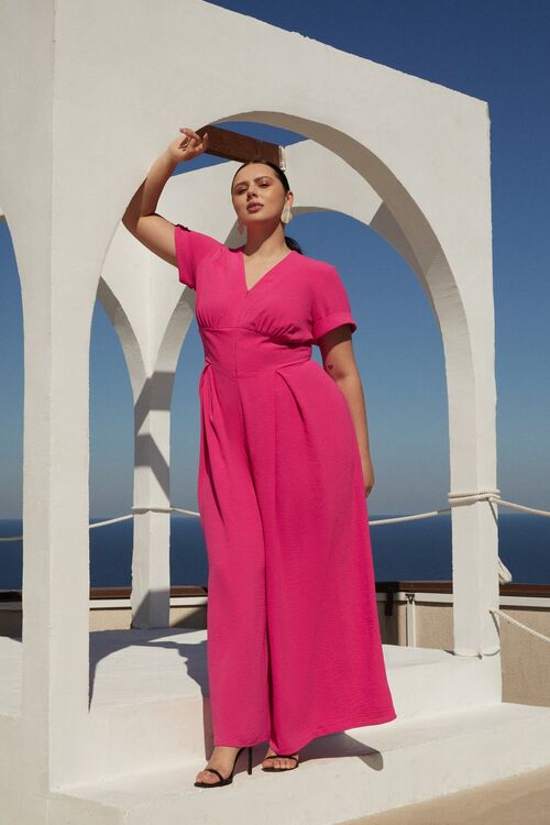 Fuchsia jumpsuit with sewn-in waistband made of crushed viscose plus size