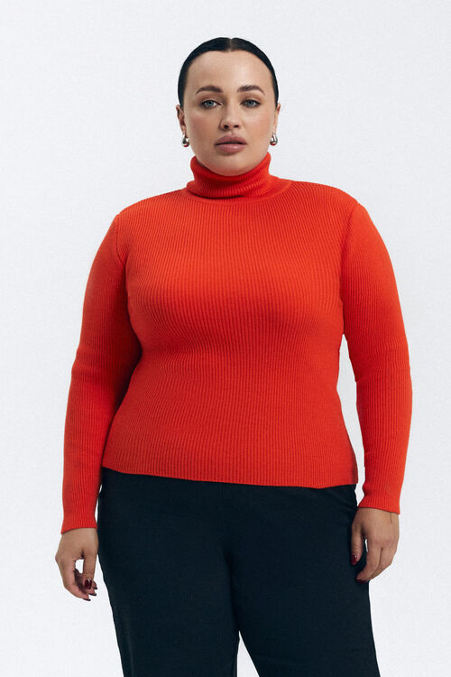 The golf is knitted in orange plus size