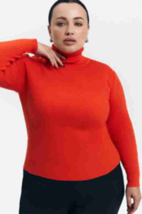 The golf is knitted in orange plus size