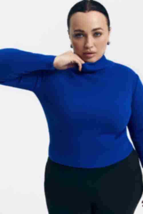 The golf is knitted in blue plus size