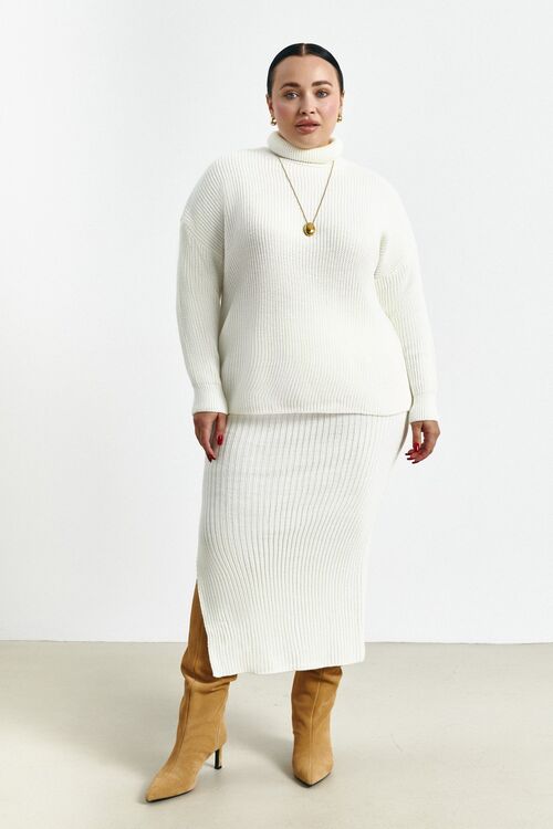 Knitted costume with skirt milky