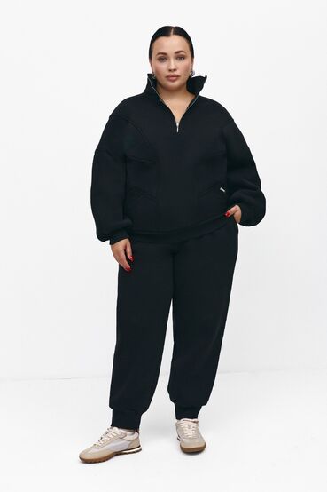 Oversized sweatshirt suit with a zipper and trousers with a pile of knitwear black plus size